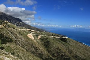 The Llogara Pass runs through uphills terrain, dense forests, and pitch-perfect altitudes.