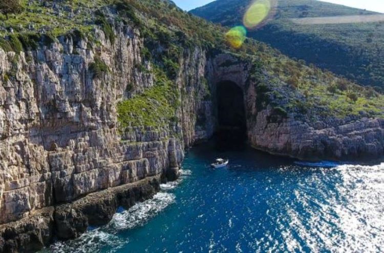 The Cave of Haxhi Aliut, the largest marine cave in Albania, is located in the Cape of Gjuhëza in the Karaburun Peninsula.